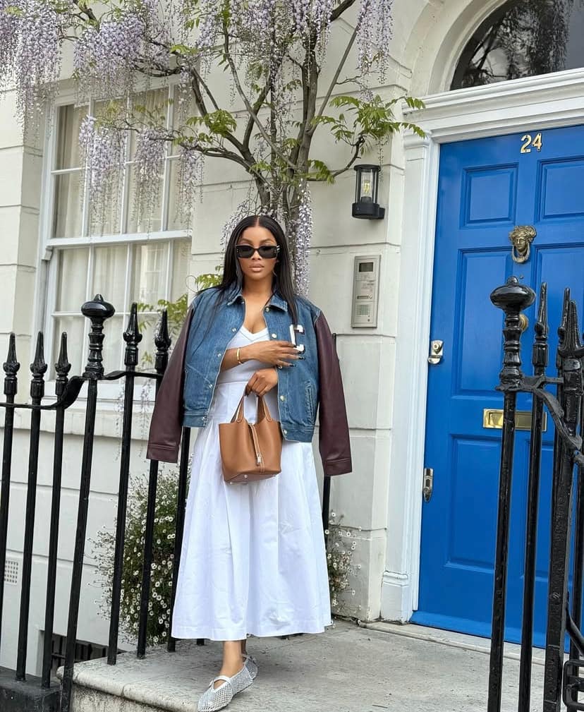 White tank layered under denim jacket with maxi skirt