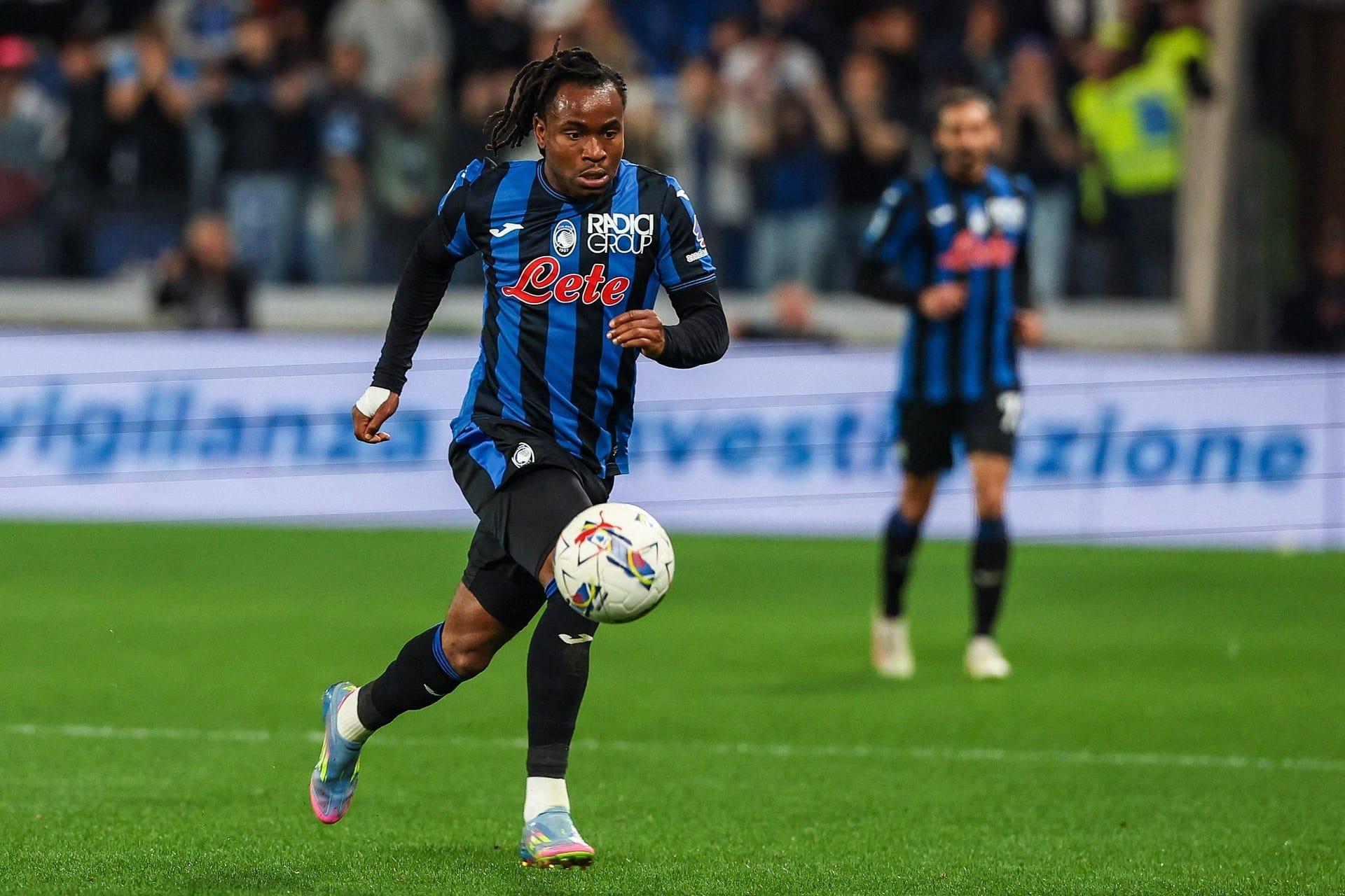 Ademola Lookman running with the ball for Atalanta