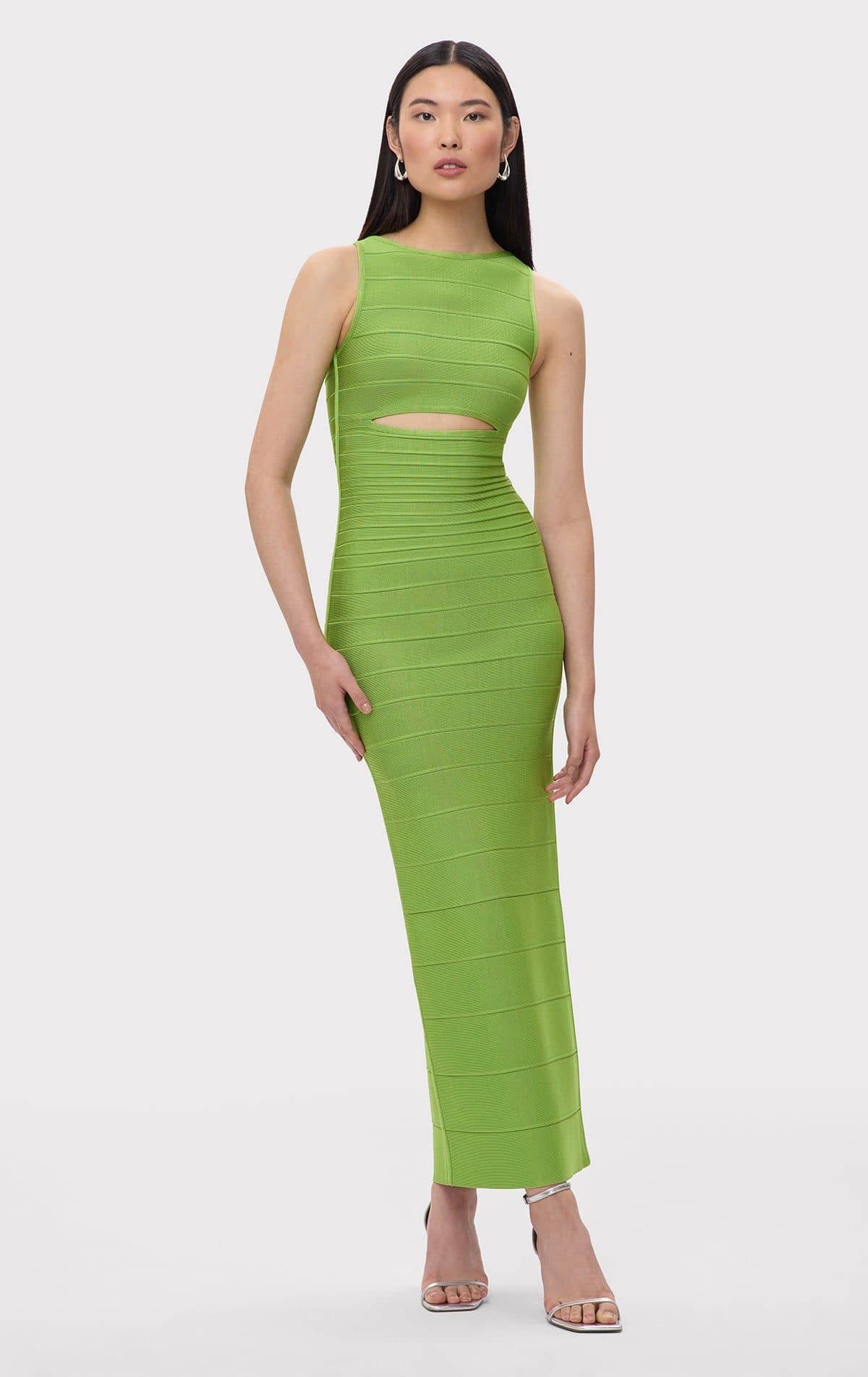 woman wearing lime green bandage dress