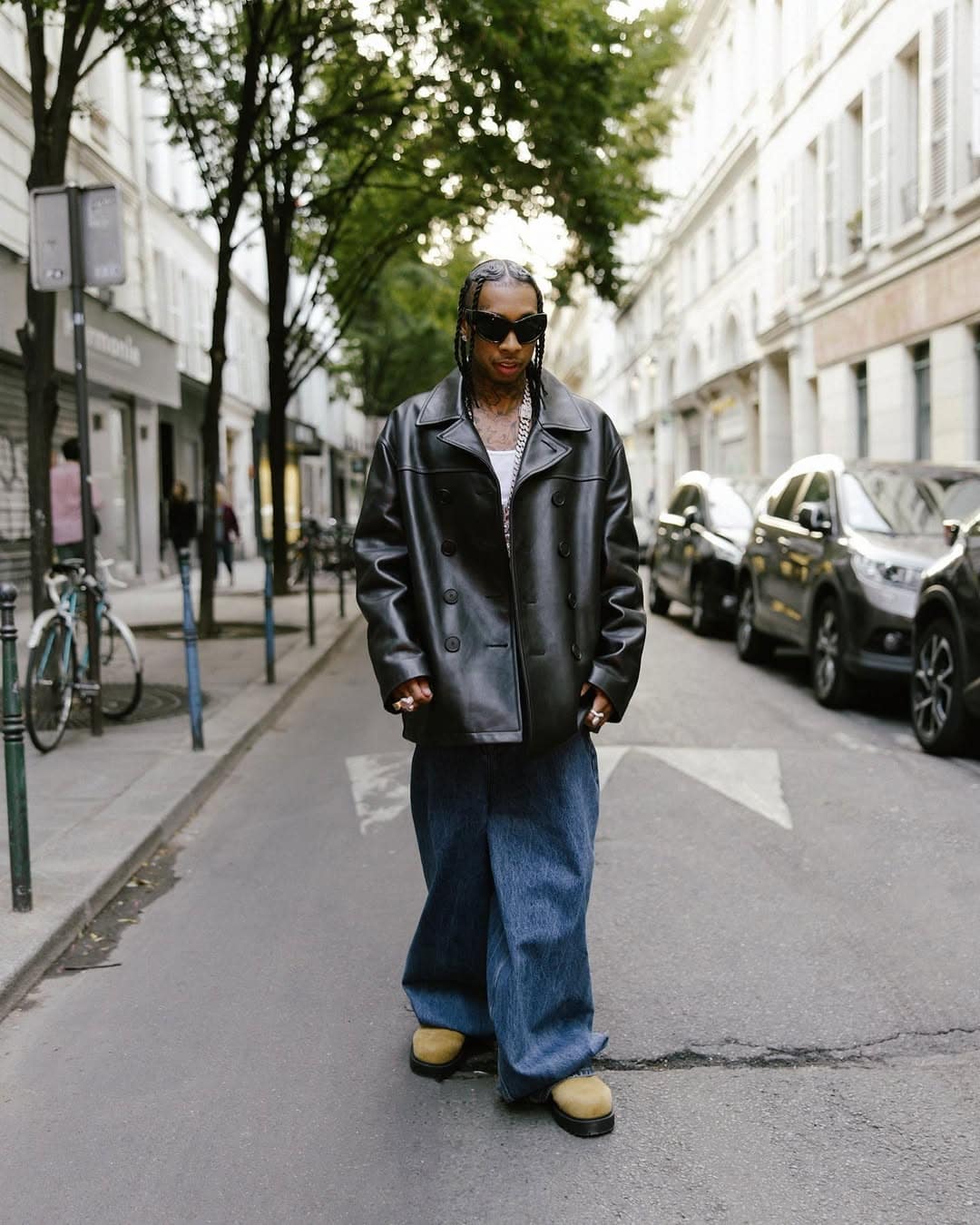 Tyga in baggy jeans and leather jacket